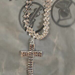 Silver plated thick chain with flexible/bendable cross with glass chips. New